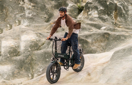 a man rides a 1000w e-bike engwe engine pro 2.0 on the sand