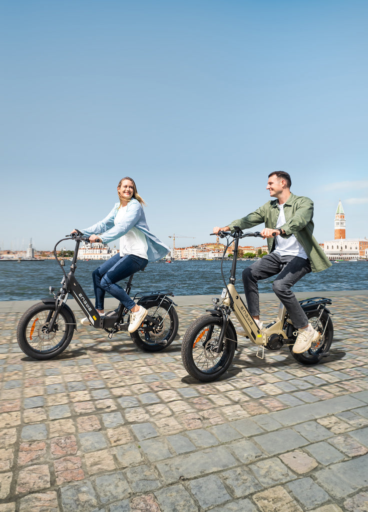 two people riding engwe l20 3.0 pro folding ebikes on the road