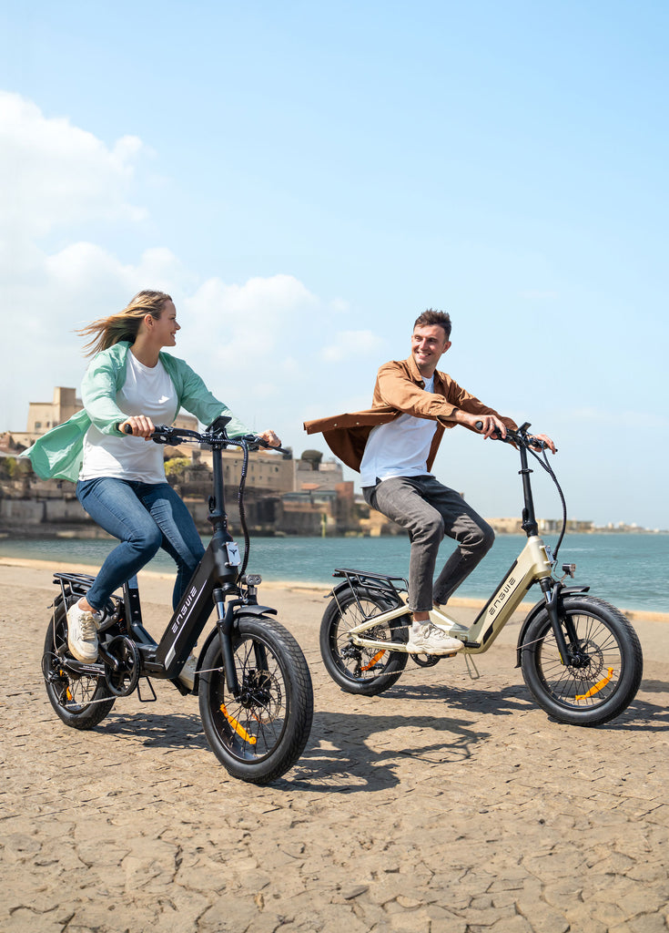 two people riding engwe l20 3.0 boost folding ebikes